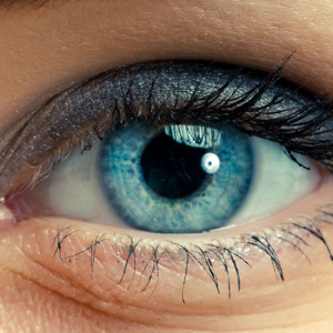 blue eyeball close up photo